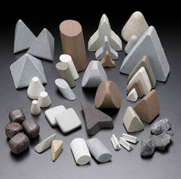 http://A%20variety%20of%20parts%20in%20different%20shapes%20&%20sizes%20that%20have%20been%20deburred%20with%20vibratory%20tumbling.