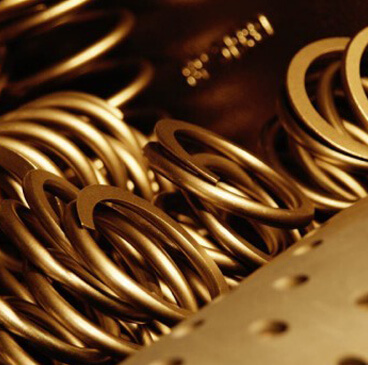 http://Close%20up%20photo%20of%20polished,%20golden%20parts%20after%20shot%20peening.