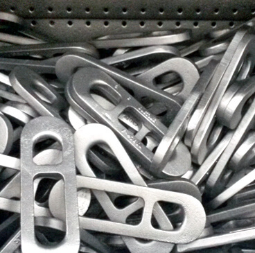 http://A%20pile%20of%20shiny%20metal%20components%20that%20have%20been%20finished%20with%20Eaglemaster's%20shot%20blasting%20process.